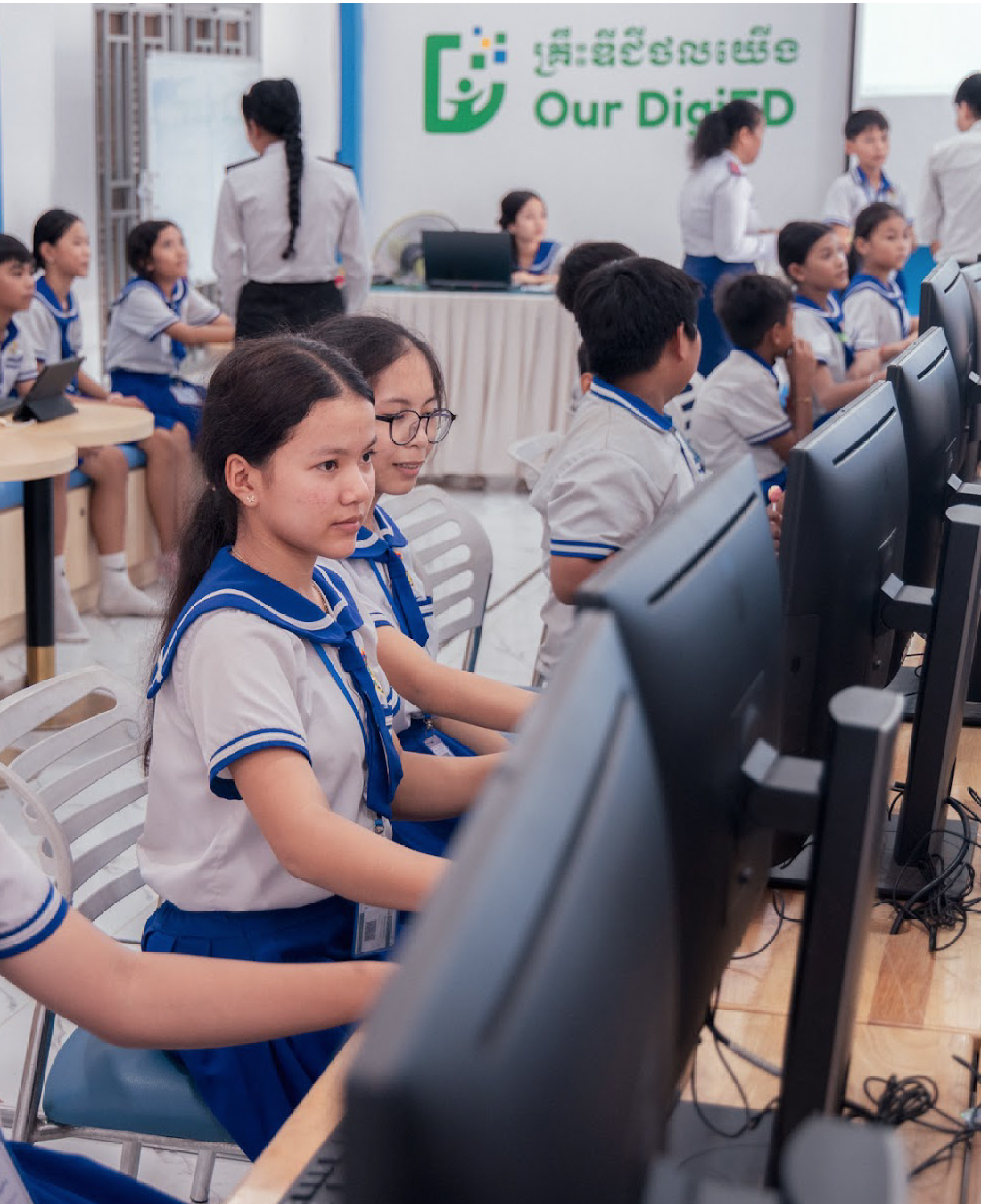 Cambodian students take part in CoolThink@JC lessons, using digital tools to create their own projects side by side in the classroom.