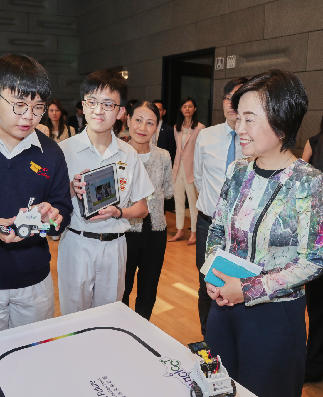 Dr Christine Choi Yuk-lin, Secretary for Education of the HKSAR Government, meets students showcasing their work at the Computational Thinking and AI Education – Mainstreaming and Commendation Ceremony in May 2023.