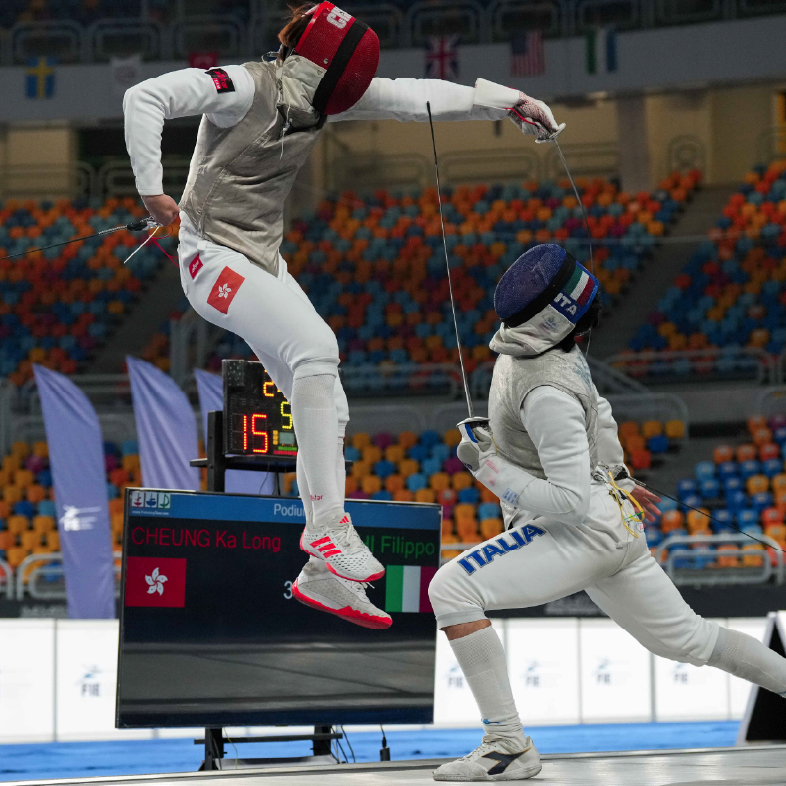 Fencing World Championships 2026 Hong Kong, China takes place at AsiaWorld-Expo. Two fencers compete in a match.