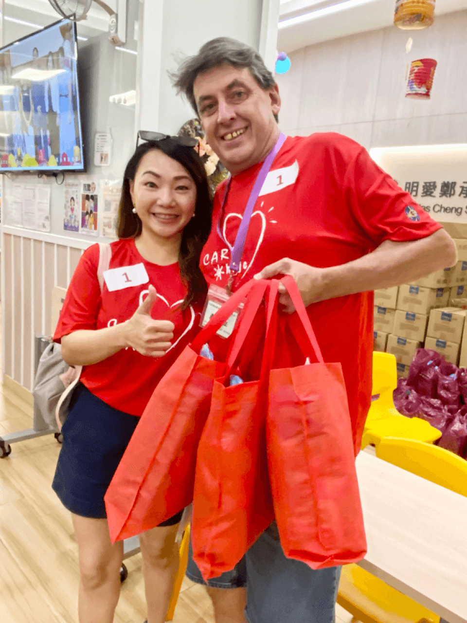 caritas mid autumn holding goodie bag