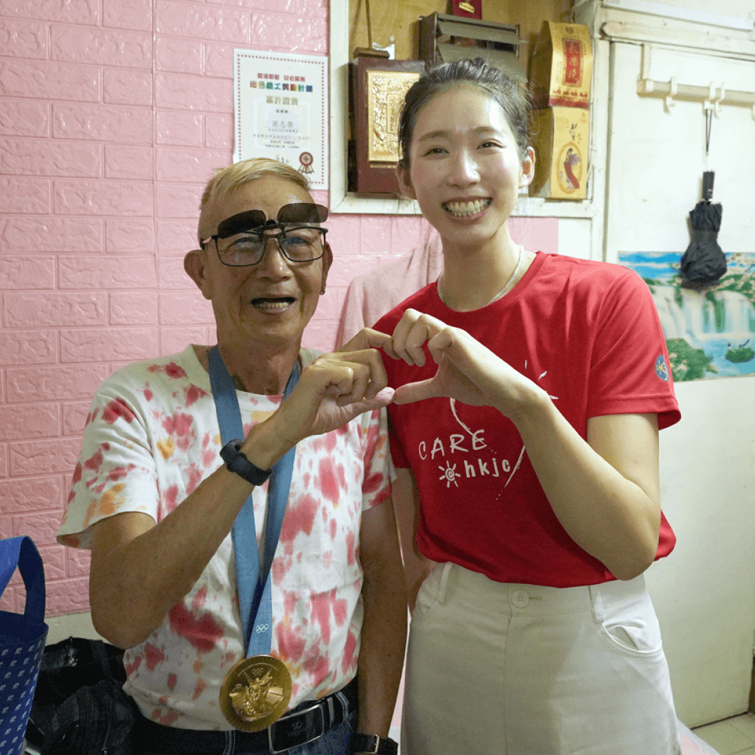 caritas mid autumn delivering goodie bag vivian kong close up