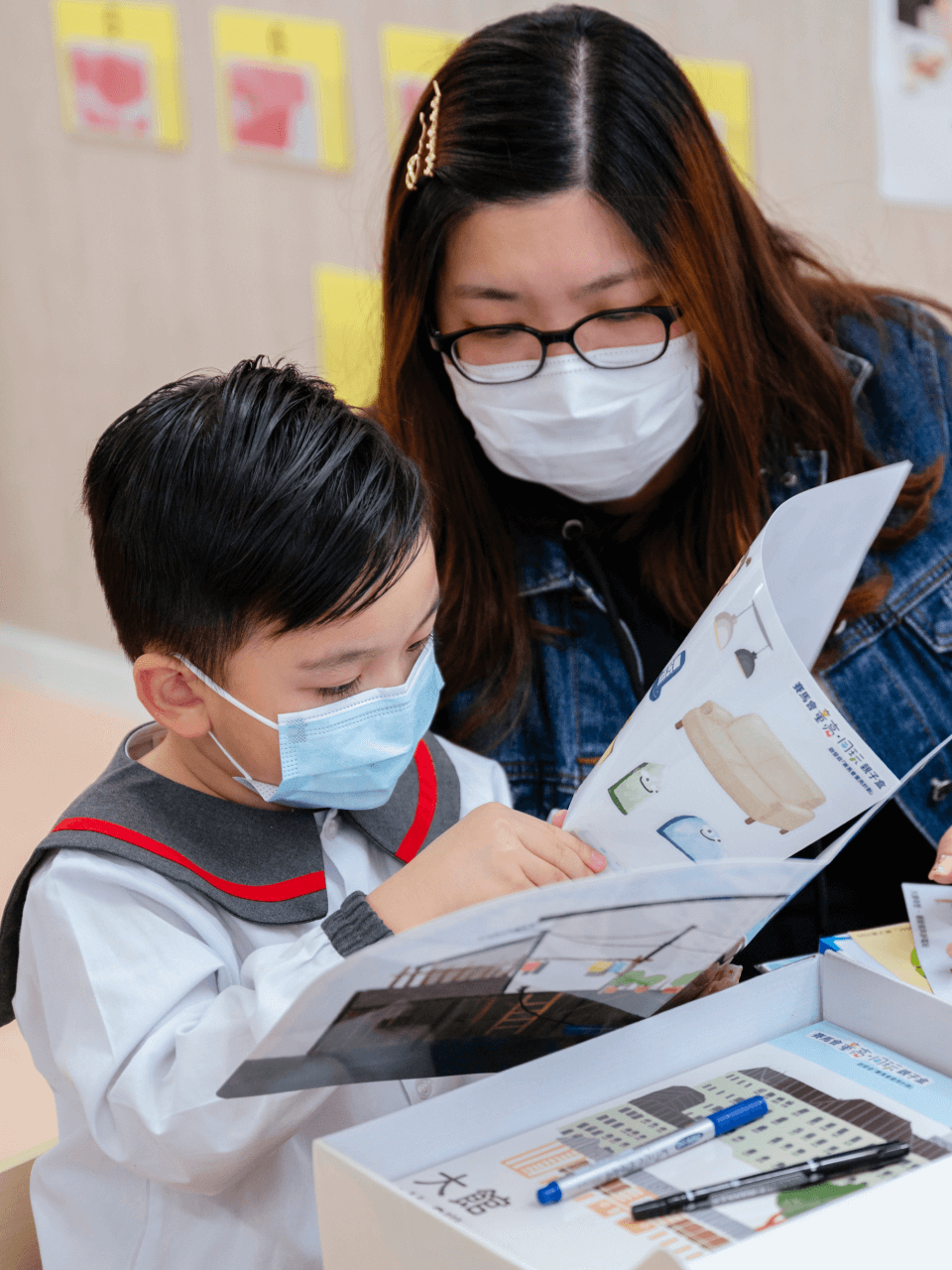 june tang reading book with kid portrait